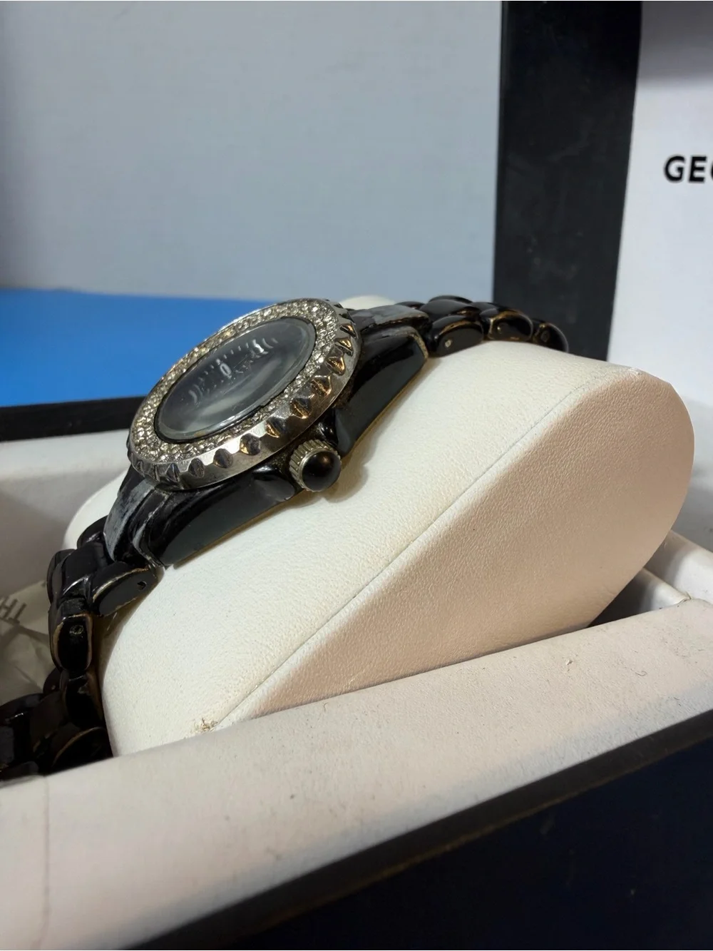 Chanel J12 women's wristwatch with a black ceramic case and bracelet and a bezel